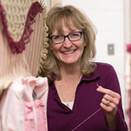 Julie McCormick, a project senior manager for CHEAR, has been helping create and produce costumes for community theater productions for more than a decade. (Photo courtesy of McCormick)